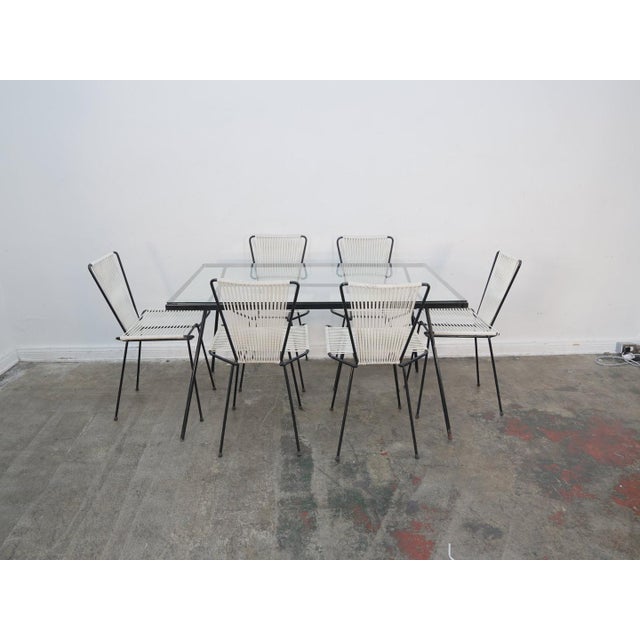 Attributed to George Nelson Arbuck Wrought Iron Dinning Table w/ Allan Gould Style Chair 55" W x 35" D x 30" H 6 Chairs...