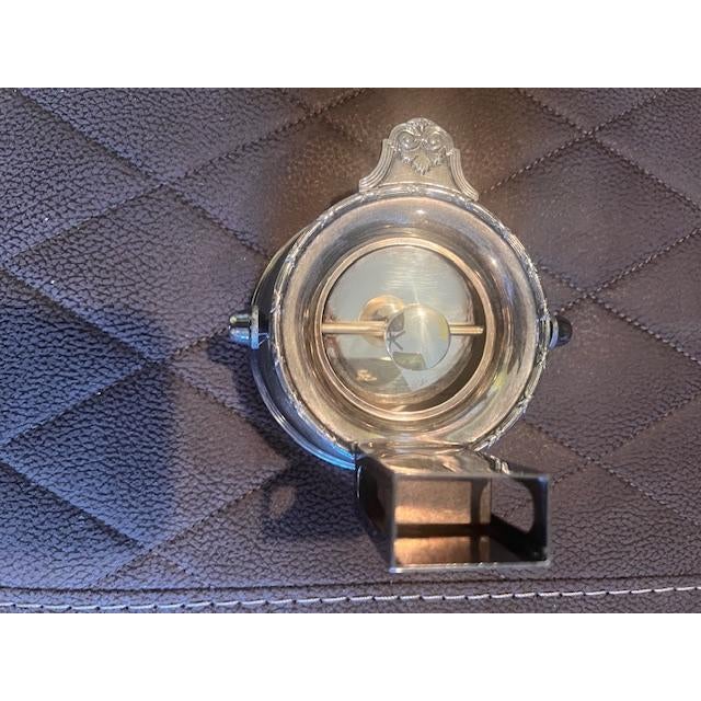 This is an antique silver-plated food warmer, dating back to the late 19th century. It features a polished metallic...