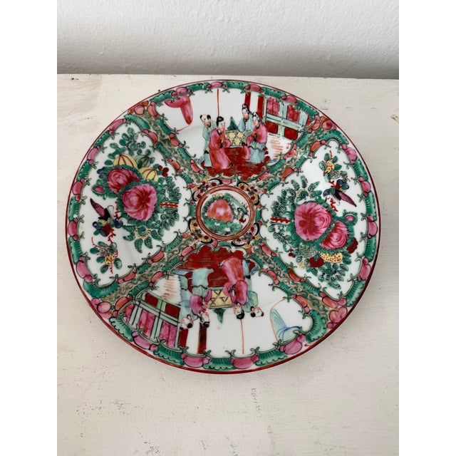 Stunning antique Famille Rose medallion hand decorated with Asian motif porcelain plate. Marked on underside.