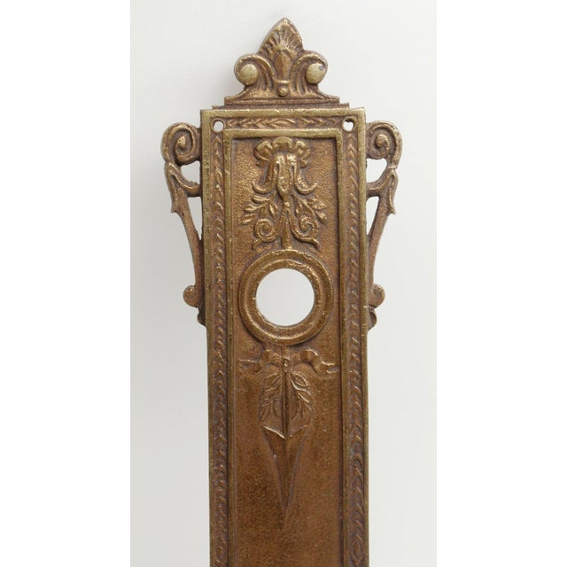 French style cast bronze passage door plate with keyhole. This is used on an interior door. The original mounting screws...