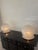 Pair of table lamps produced by Venini, 1970s, in Murano glass with spiral fabric and chrome base. This piece is...