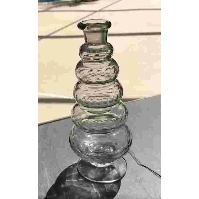 Nice small stopperless German Decanter C. 1830 with graphite pontil. Rows of impressed patterns. Excellent condition....