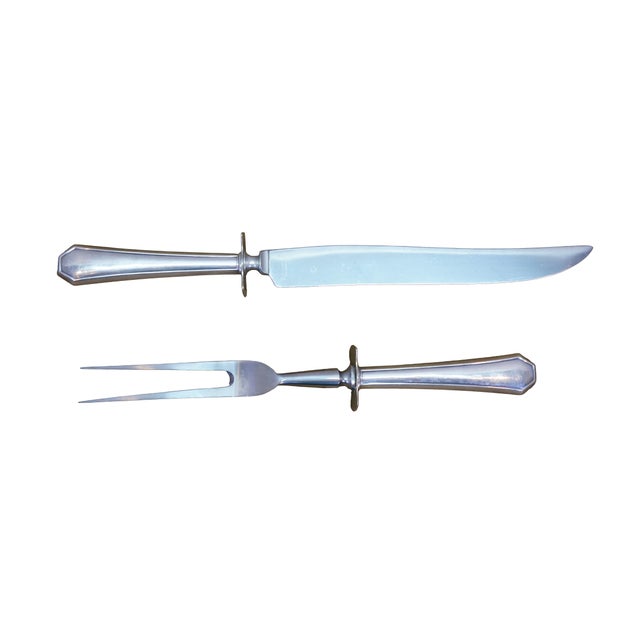 Elegant vintage 2-piece meat carving set featuring classic, heavy hollow sterling silver handles paired with durable...