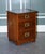 Military campaign bedside nightstand end table. It has brass fittings and traditional brass handles. The top is inlaid...