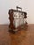 Fantastic quality antique Victorian tantalus, having a quality antique Victorian oak tantalus containing three quality...