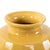 A stunning piece from our collection featuring a honeycomb-designed texture. With its rich golden yellow color, this vase...