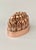 Offered is a lovely 19thc English copper jelly mold. This mold dates from the 1870's. This mold features rising columns of...