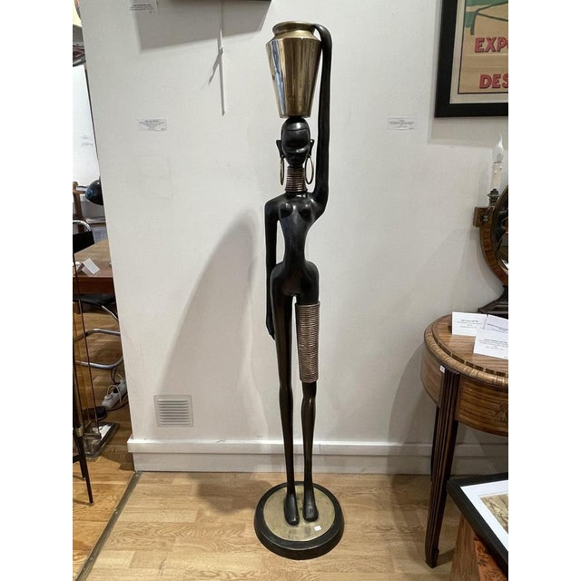 Stunning Bronze of an African lady carrying water, in the style of Karl Hagenauer (1898-1956), 1970’s, Bronze with double...