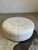Vintage oversized white leather moroccan pouf ottoman, featuring smooth leather with an embroidered floral design. In...