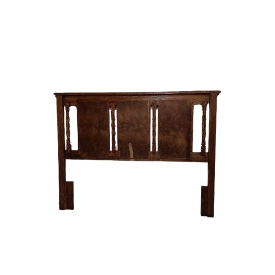 This medium tone wood Queen Headboard features intricate carvings, adding a touch of elegance to any bedroom. Crafted from...