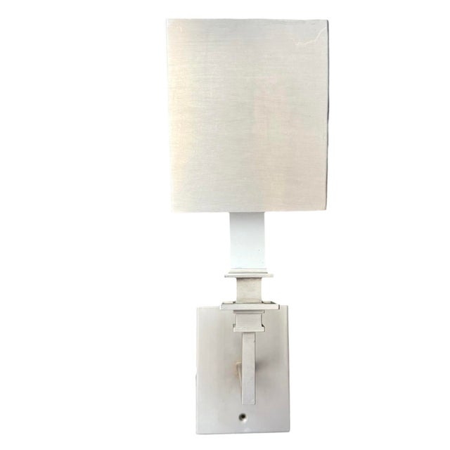A pair of wall sconces from the Urban Electric Company. Handmade in South Carolina, these custom sconces are made of...