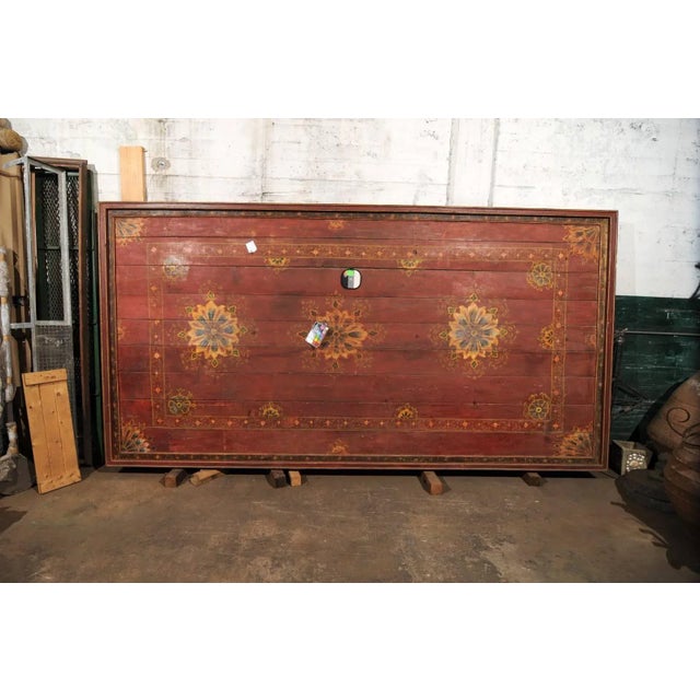 A grand sized 19th century painted wood Southern Indian decorative ceiling panel. This wooden ceiling panel from the Tamil...