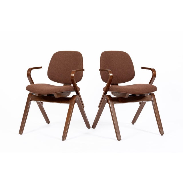 This set of two vintage mid century modern bent plywood armchairs designed by Joe Atkinson for Thonet are circa 1950. This...