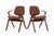 This set of two vintage mid century modern bent plywood armchairs designed by Joe Atkinson for Thonet are circa 1950. This...