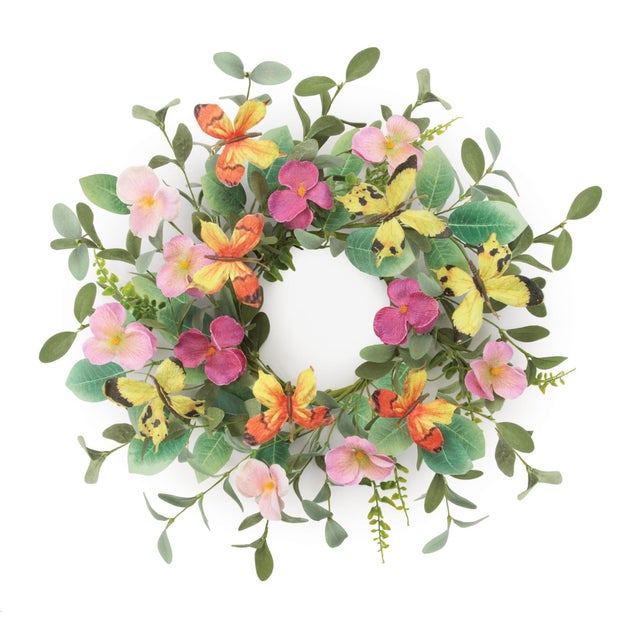 Create a whimsical, garden-inspired centerpiece with this Pansy and Butterfly Floral Candle Ring. Measuring 17 inches in...