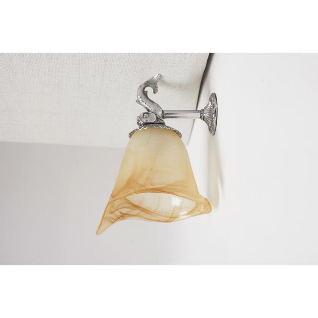 Vintage fish wall sconce with a silver-tone fish mount and hand-shaped marbled frosted glass tulip shade, French circa...
