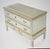 An original Danish Louis Seize "Dragon Chest"/chest of drawers, delicately painted green and decorated with gold. A...