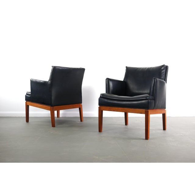 Pair of mid century modern lounge chairs by Marble Imperial. Original leather to the frame. Some light scuffing/scratching...