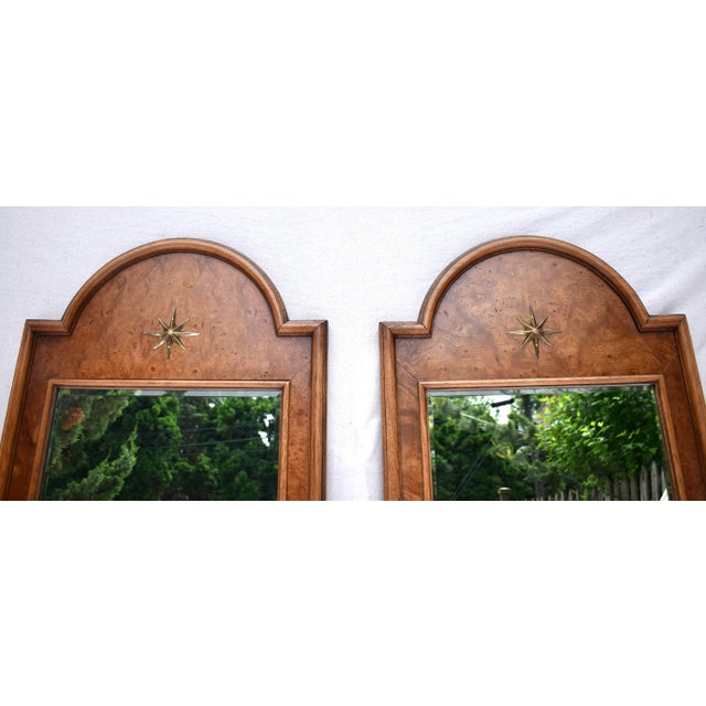 An unusual mid 20th century version of Classic Italian 'Serliana" shape Olive Burl-wood arched wall mirrors with distinct...