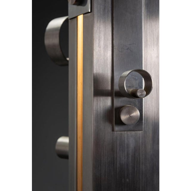 1960s Sculptural Uplighter Floor Lamp with Integrated Coatrack period: 1960sorigin: Italy dimensions (cm): h176 x w30 x...