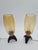 This pair of table lamps from Germany was created in the 1950s, reflecting mid-century modern trends. The design is based...