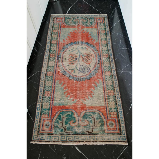 This authentic hand-knotted Gordes rug features a stunning blend of vintage character and timeless Anatolian artistry. Its...