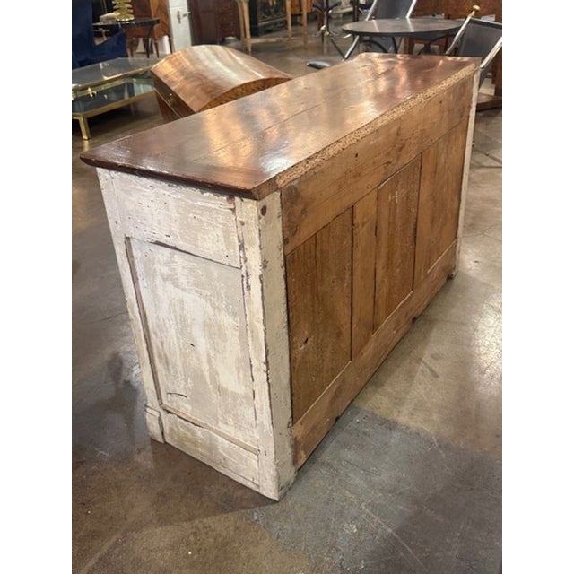 The 18th century carved and painted oak French buffet is a stunning piece of furniture that adds a real touch of charm to...