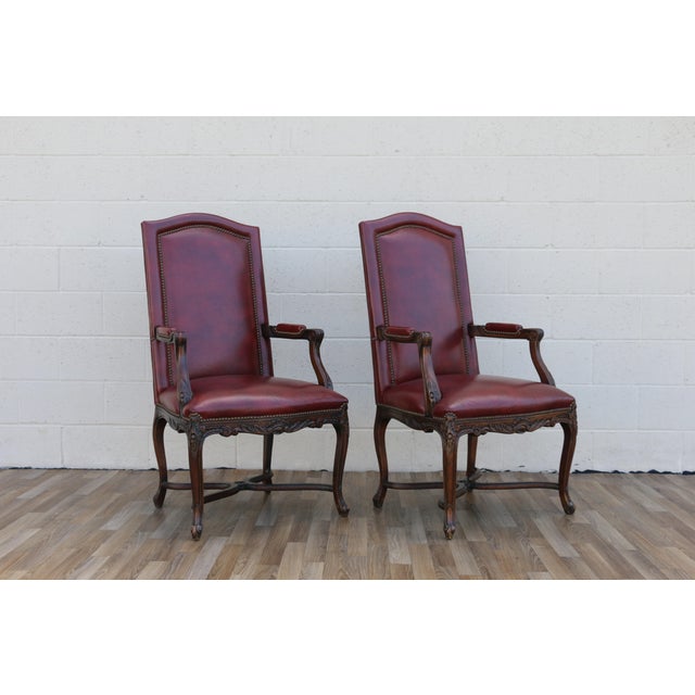 English Pair of Vintage English Regency Style Leather Armchairs | Carved Wood Frame, Nailhead Trim For Sale - Image 3 of 18