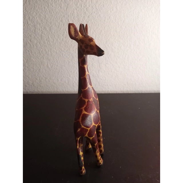 This is a Handcarved Wooden 8" Giraffe Figurine. MINIATURES
