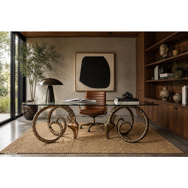 Inspired by the celebrated sculptural works of Alain Chervet, this striking pair of mid-century modern brass ibex rams...