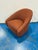 Stylish Modern Slope Swivel Chair with Clay nubby fabric. Showroom floor sample.