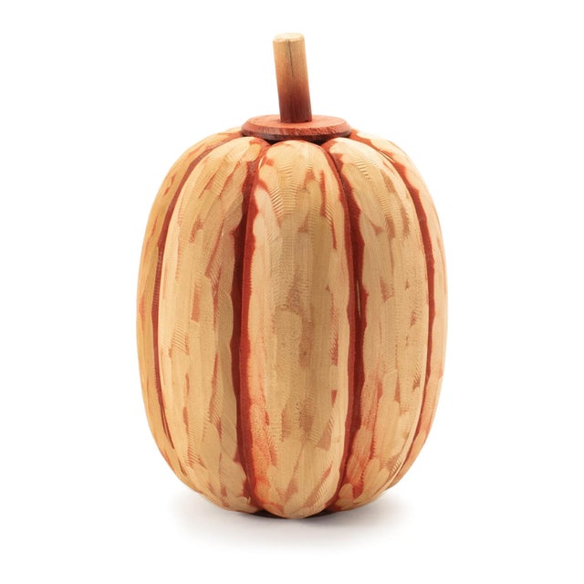 Bring the spirit of fall to your home with this set of two Carved Fir Wood Pumpkins. Featuring festive orange and red...