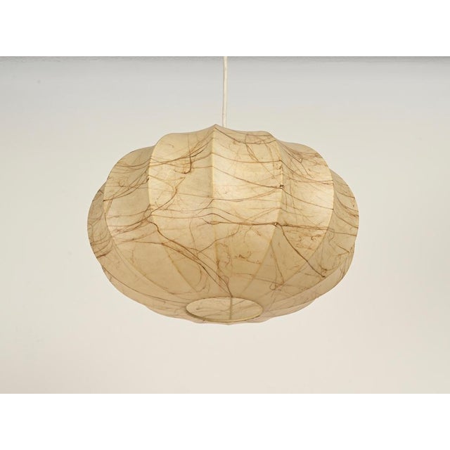 Stunning and rare mid-century round cocoon pendant with a wonderful warm beige patina and a marbled finish. This stylish...