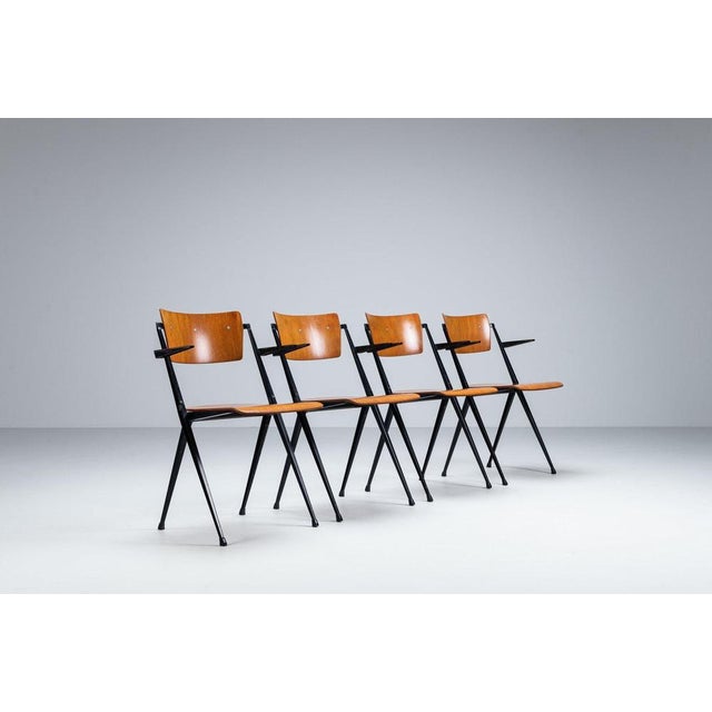 Set of four “Pyramid” dining chairs designed by Wim Rietveld for Ahrend de Cirkel, The Netherlands, 1960. A true icon of...