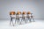 Set of four “Pyramid” dining chairs designed by Wim Rietveld for Ahrend de Cirkel, The Netherlands, 1960. A true icon of...