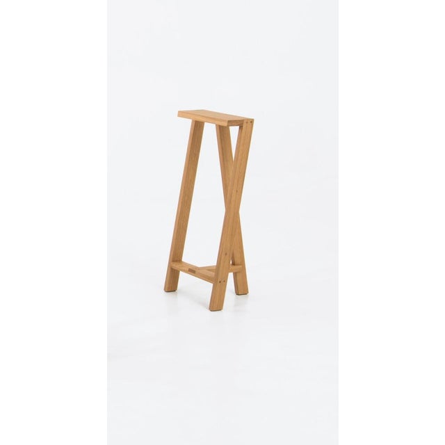 Set of 4 large Pausa oak stool by Pierre-Emmanuel Vandeputte Dimensions: D 32 x W 35 x H 80 cm Materials: oak wood...