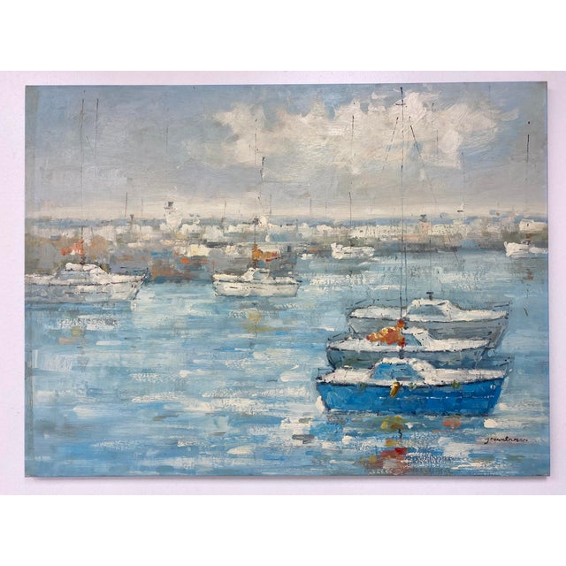 A light and atmospheric original oil painting on canvas capturing a peaceful harbor scene with gently bobbing sailboats...