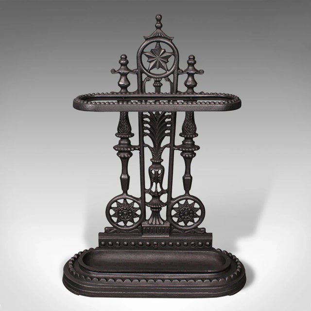 This is a vintage decorative stick stand. An English, wrought iron hallway umbrella rack, dating to the late Art Deco...