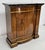 A late 20th Century Neoclassical Partial Gilt Decorated Fruitwood and Faux Marble Top Console Cabinet. One adjustable...