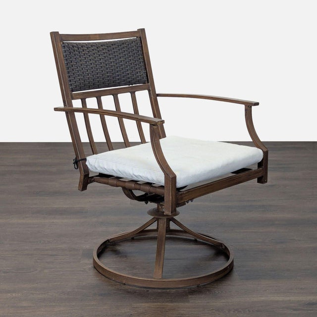 This Orchard chair features a sturdy metal frame with a stylish brown finish. It has a woven backrest for added comfort...