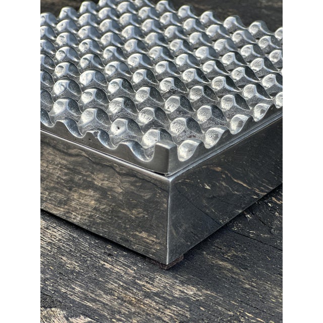 Large cast aluminum ashtray from the 2000s. size 21 x 21 cm Height 6 cm