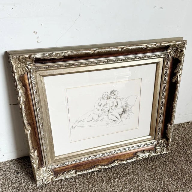 Delve into the world of artistic mastery with "Two Girls Reclining," a captivating framed nude art piece by the acclaimed...