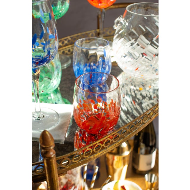 Dynamic streaks of orange adorn the mouthblown Chiara Orange Short Tumbler. Whether you go for a single color or a mix of...