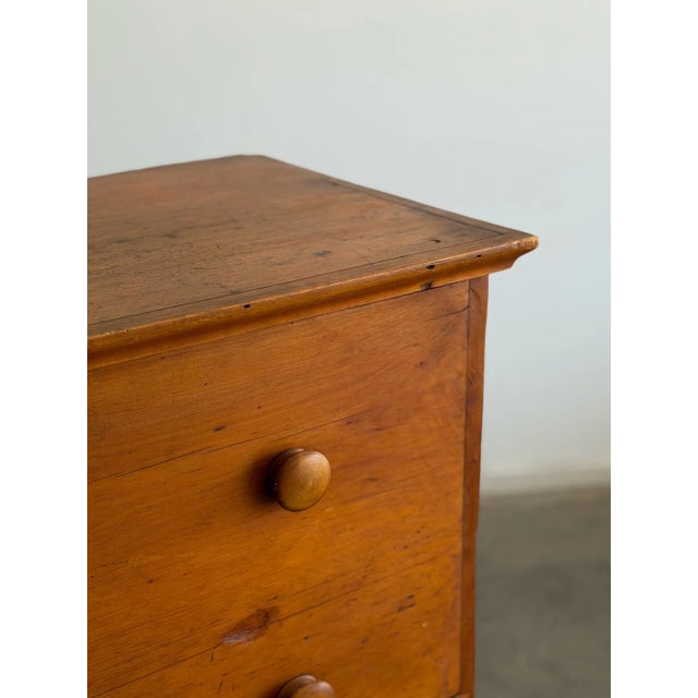 W39 D16 H36.5 The “19th Century Mule Chest Dresser” is crafted in pine wood and has been fully preserved in a warm,...