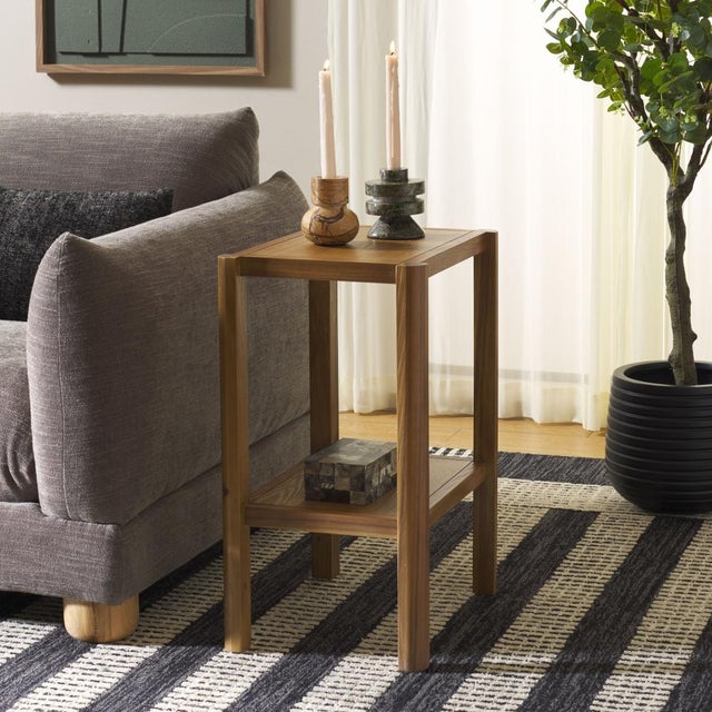Discover the rustic charm of the Hendro Accent Table. Beautifully crafted from Acacia wood and MDF, this piece adds a...