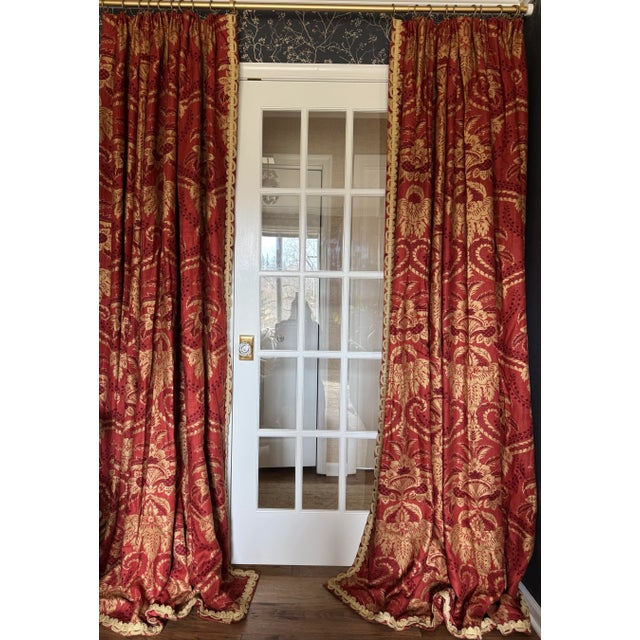 Custom interlined linen damask drapery panels with French pinch pleats and matching tiebacks, sourced from a...