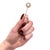 A fine Mid-Century gold, pearl, and diamond stickpin. In 14 karat yellow gold. With a prong-set mabe pearl set to the...