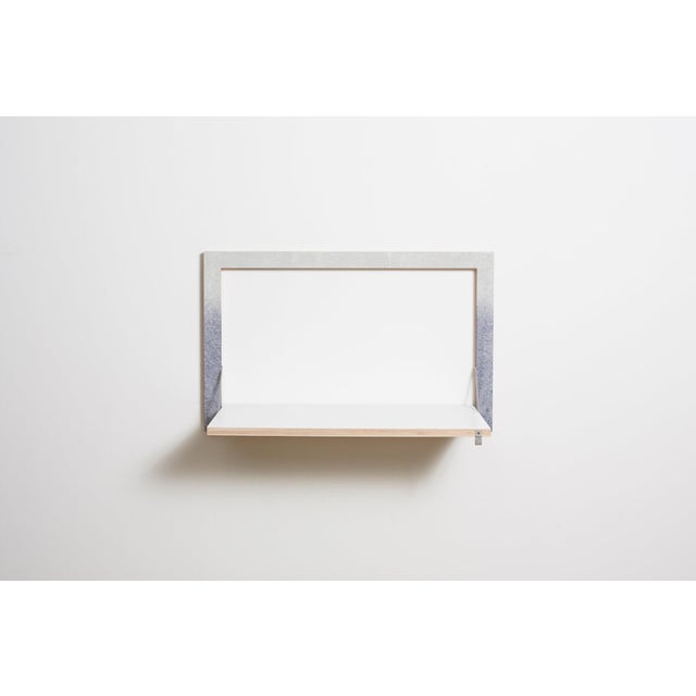 Wall art, workstation functional and discreet, this fläpps wall desk makes the perfect seated or standing workstation...