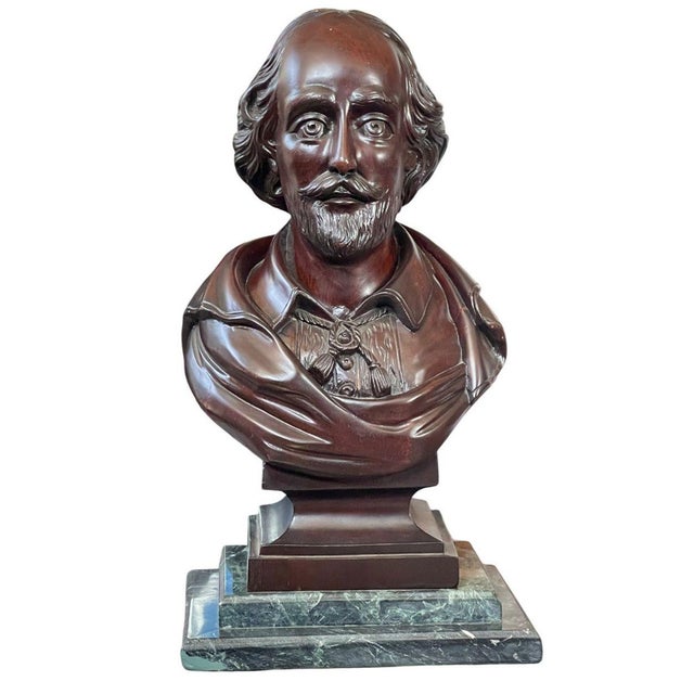 A refined set of four 20th-century carved Mahogany busts representing influential literary and historical figures (From...