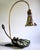 Exceptional Art Nouveau “Lotus Flower” table lamp, from a private collection, dating from the 1970s–1980s. The lamp begins...